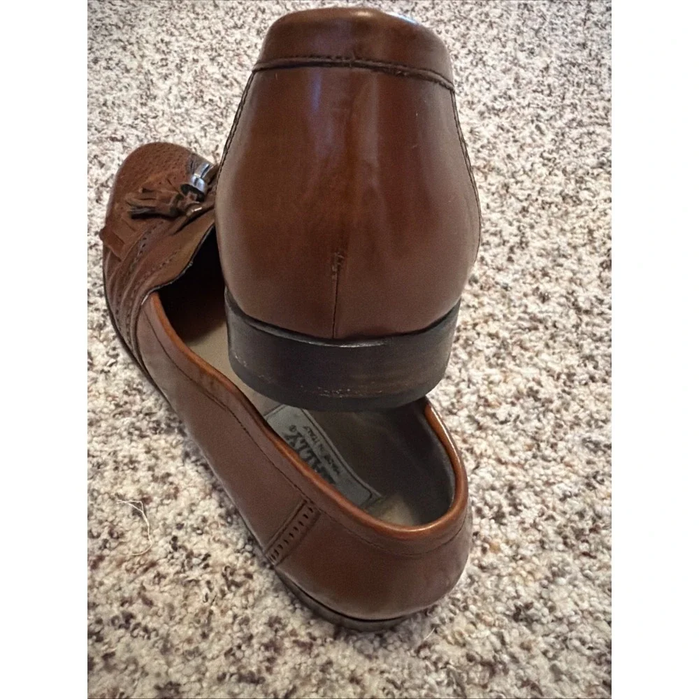 Bally tassel apron